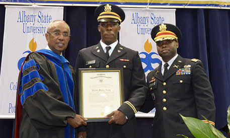 Photo of Dr. Dunning with ROTC members