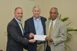 Courtney Brinson, AT&T Georgia regional director of external affairs, with ASU President Art Dunning and Randae Davis